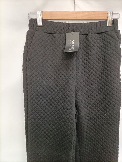 SHEIN. Pantalón negro guateado  T.xs