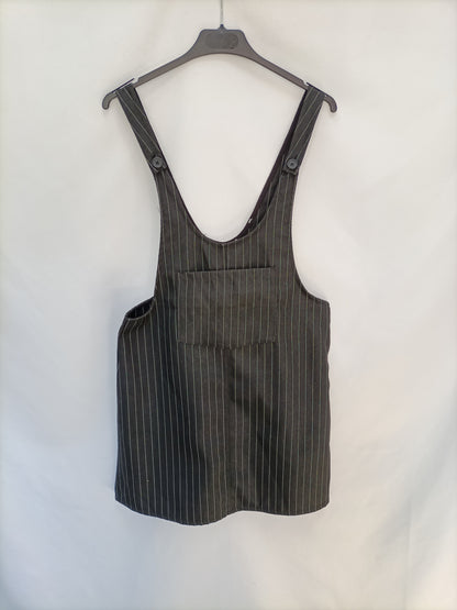 PULL&BEAR. Peto negro rayas T.s