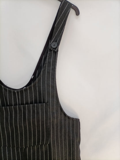 PULL&BEAR. Peto negro rayas T.s