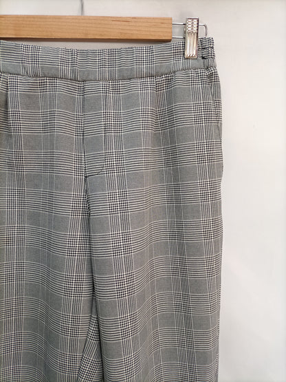 PULL&amp;BEAR. Flowy houndstooth trousers Ts