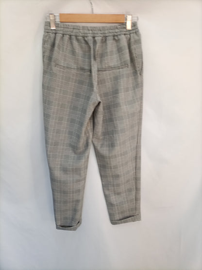 PULL&amp;BEAR. Flowy houndstooth trousers Ts