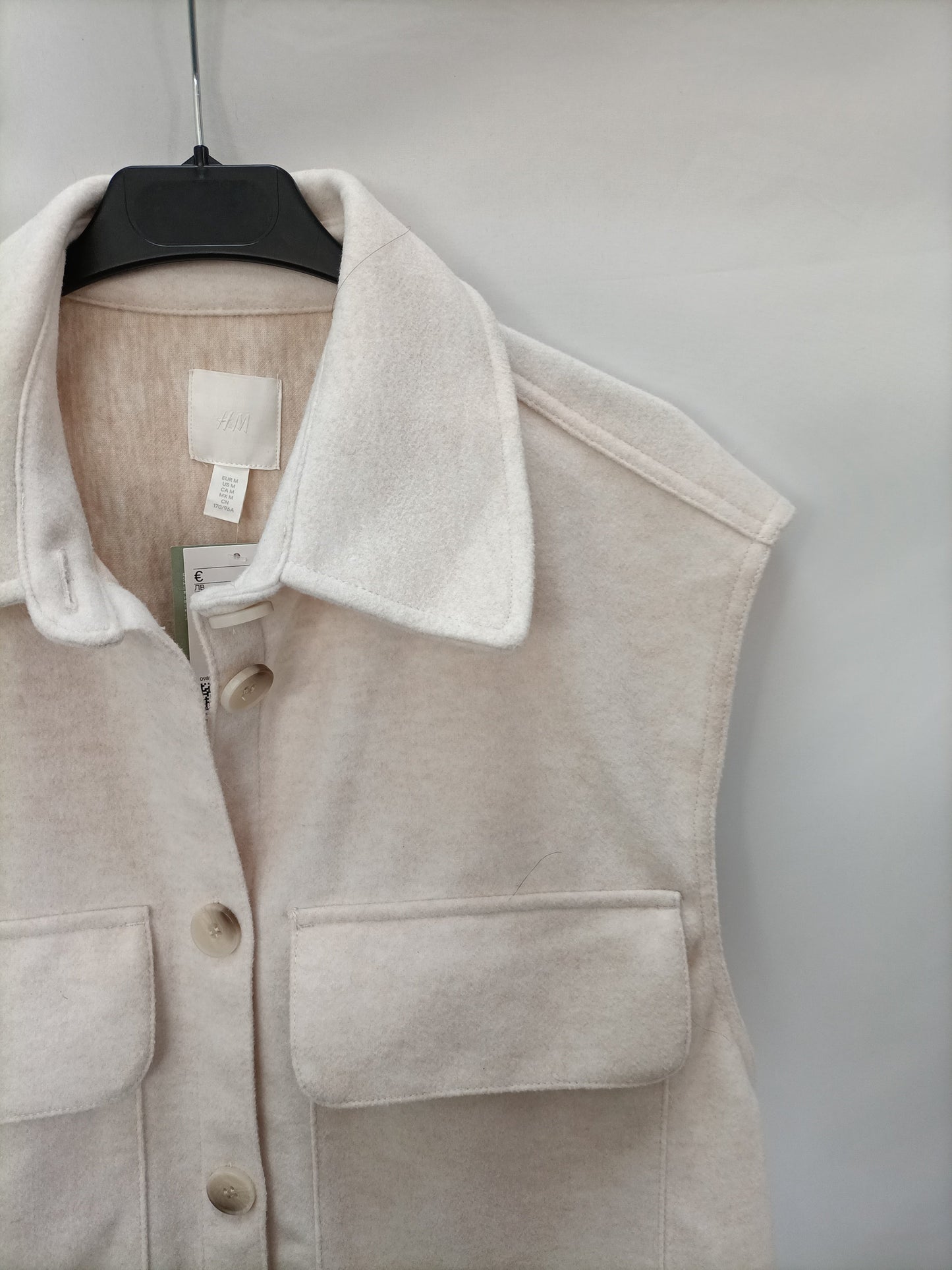 H&M. Chaleco beige frenela T.m (tara)