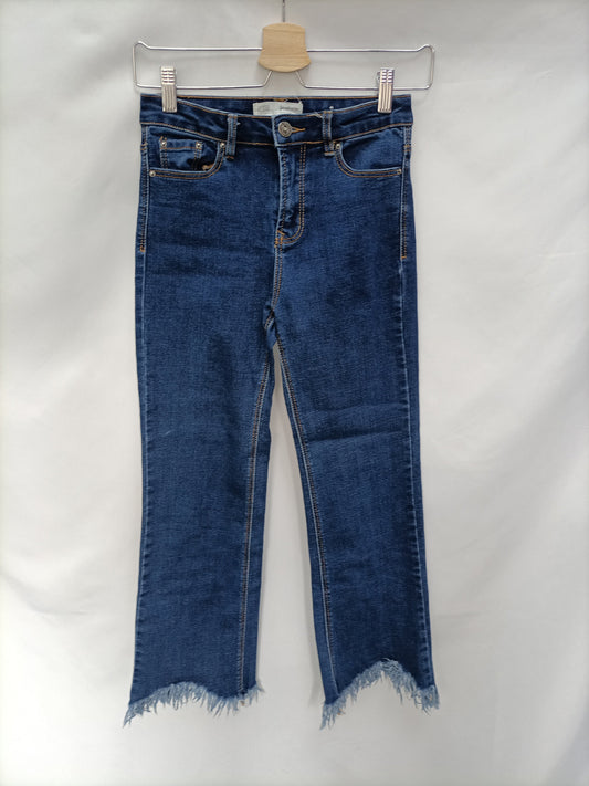 STRADIVARIUS. Pantalón vaquero flecosT.34