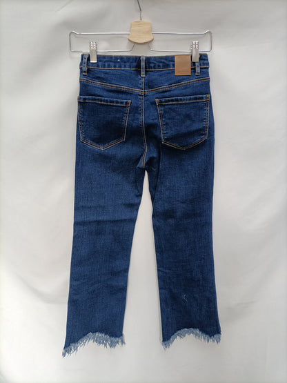 STRADIVARIUS. Pantalón vaquero flecosT.34