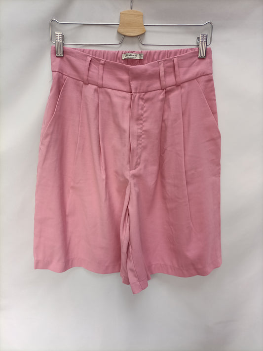 STRADIVARIUS. Bermudas rosas  T.40