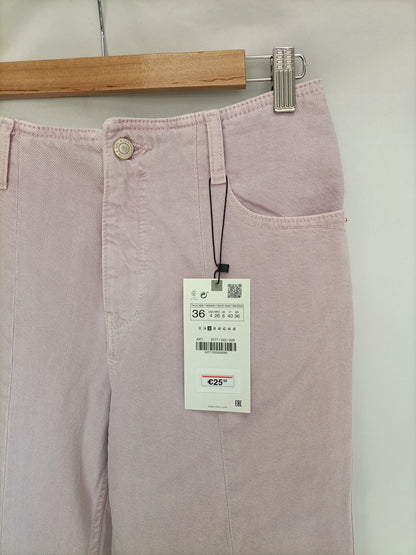 ZARA. Pantalón rosa apertura T.36