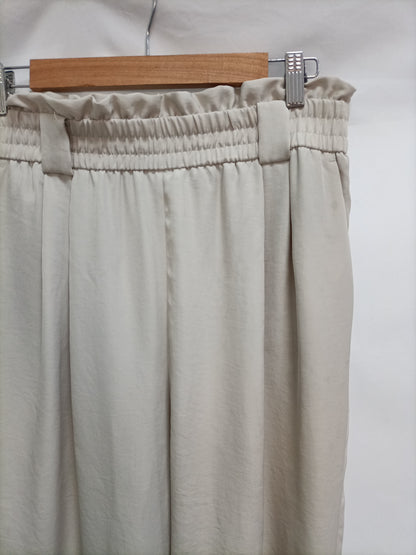 ZARA. Flowy beige trousers TL