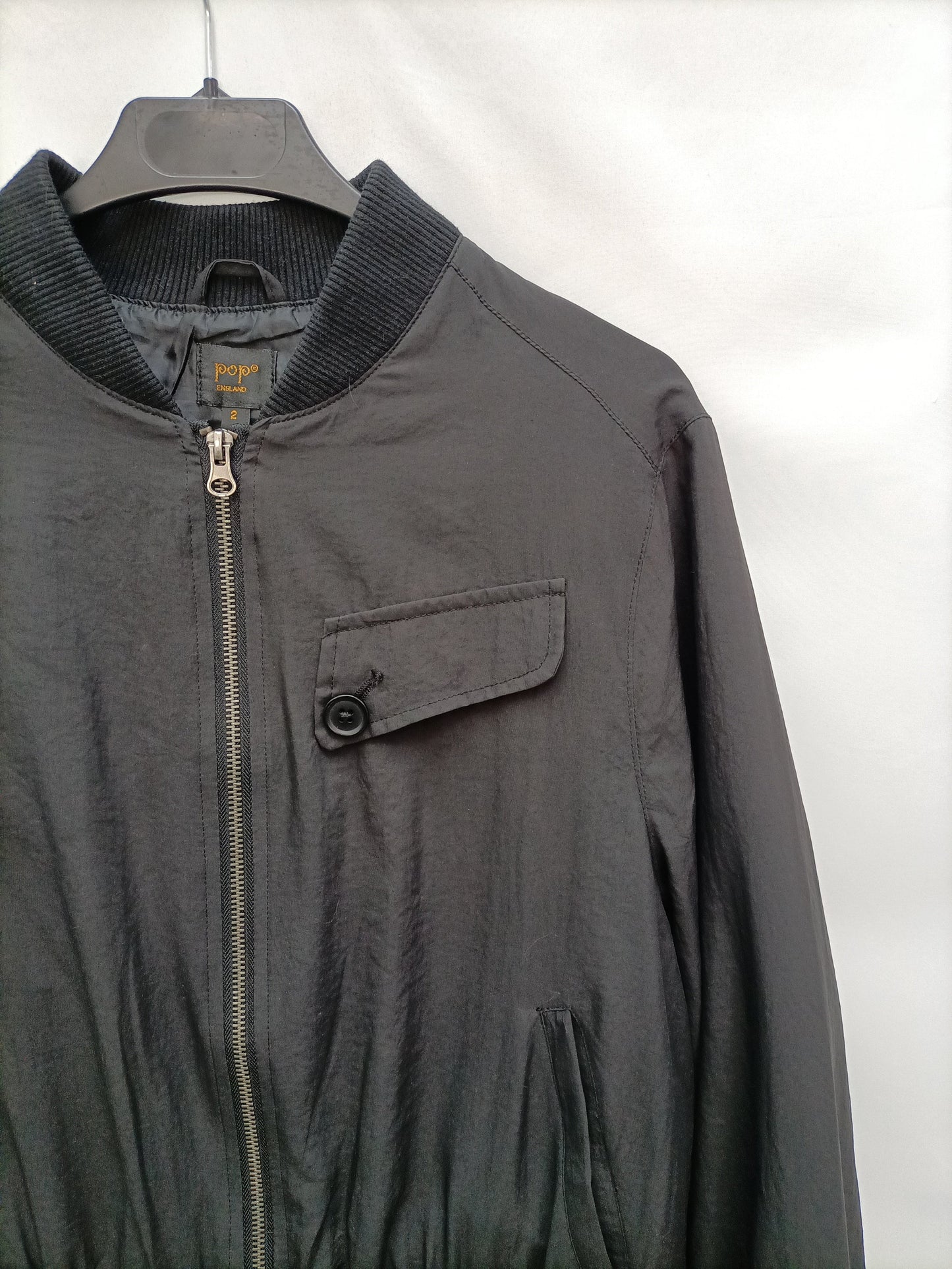POP ENGLAND. Bomber negra fluida  T.2(m)