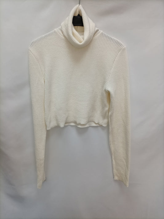 BERSHKA.Top/jersey corto beige T.l