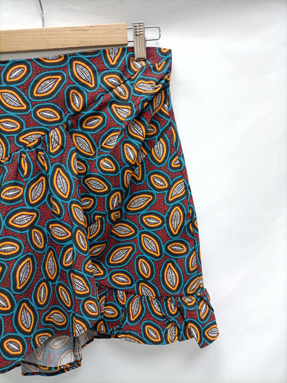 SFERA. Falda corta africana T.s