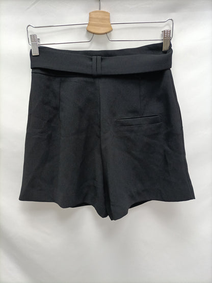 MANGO. Pantalón corto fluido T.36