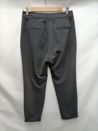 STRADIVARIUS. Pantalón gris fluido T.36