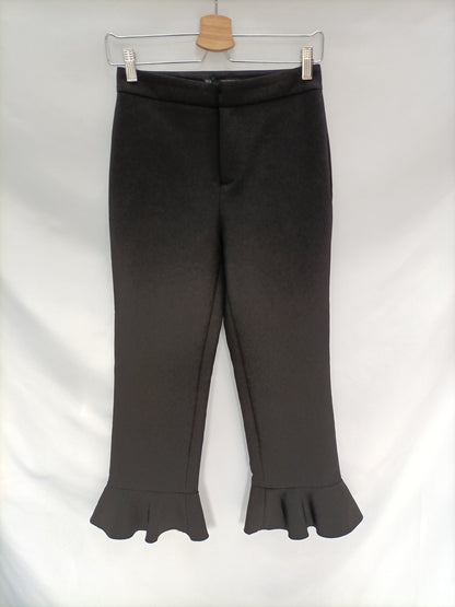 SFERA. Black trousers with ruffles Ts