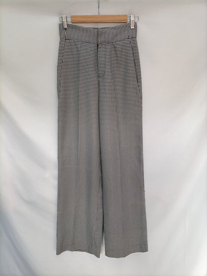 BLANCO. Pantalón pata de gallo T. 34