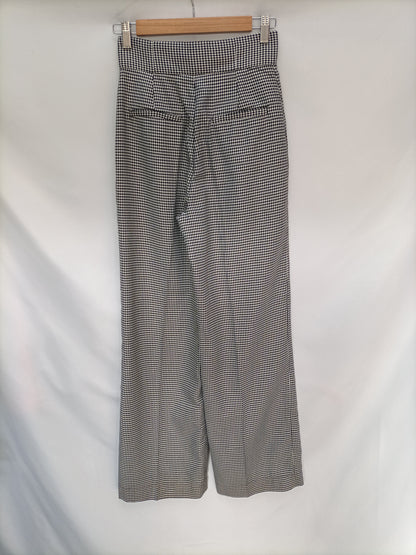 BLANCO. Pantalón pata de gallo T. 34