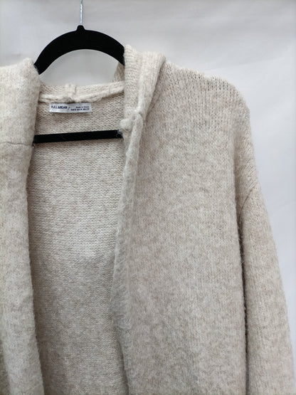 PULL&BEAR.  Cárdigan de punto beige  T.m
