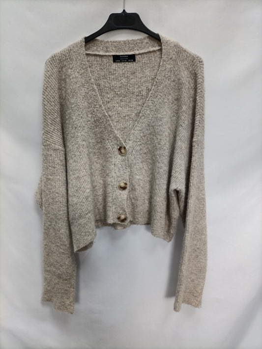 BERSHKA. Rebeca de punto beige  T.m