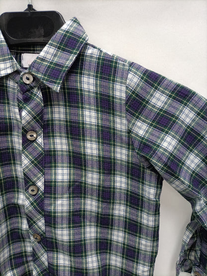 MARIA UCEDA. Checkered shirt, 2 years old