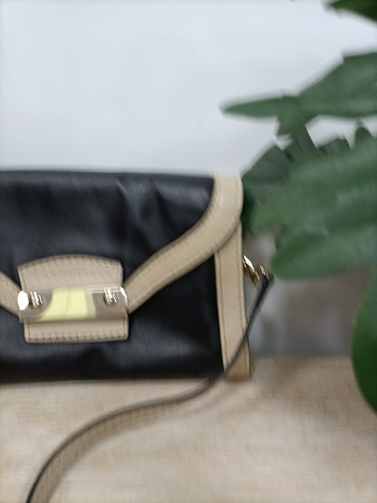 COCCINELLE. Bolso bicolor