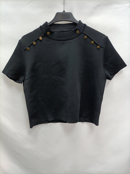 OTRAS. Top negro botones T.u(m)