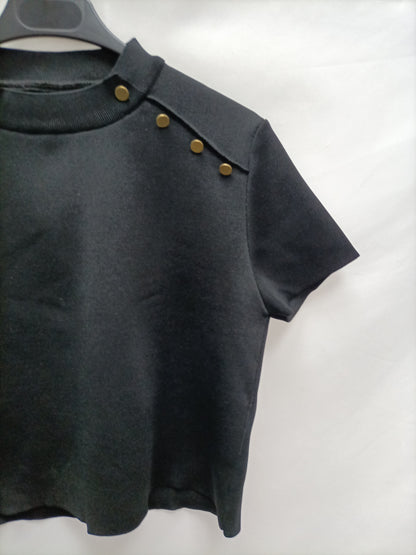 OTRAS. Top negro botones T.u(m)