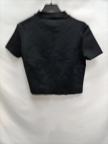 OTRAS. Top negro botones T.u(m)