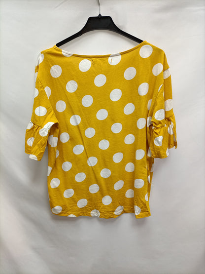 SFERA. Camiseta mostaza lunares T.s