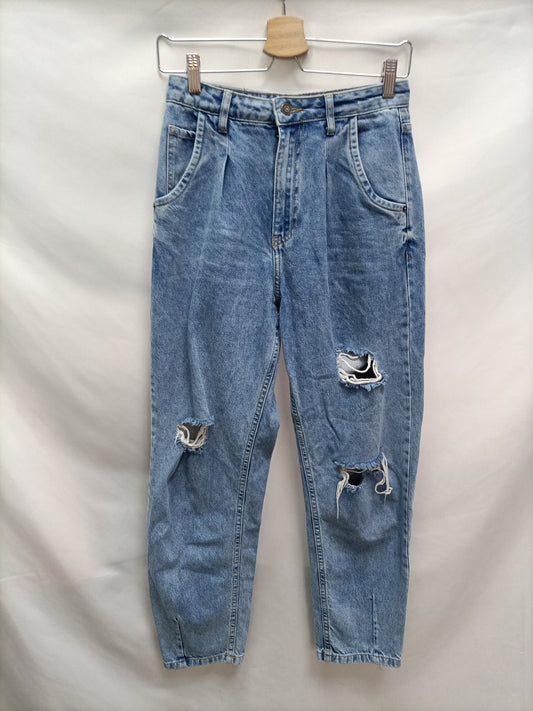 INSIDE. Pantalón slouchy rotos T.36