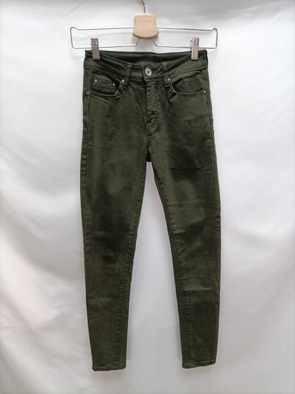OTHERS. Green skinny pants size 34