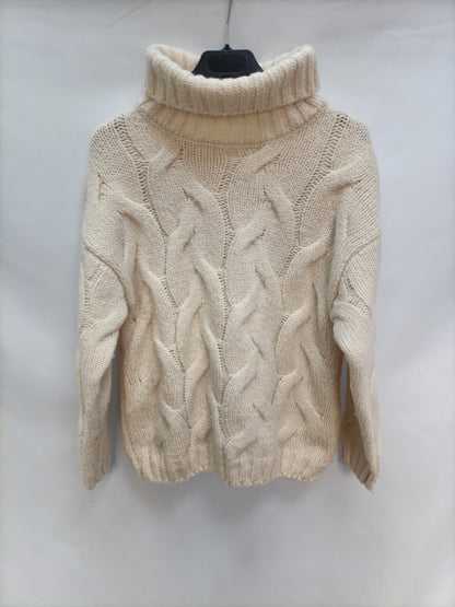 ZARA. Jersey beige ochos T.13/14