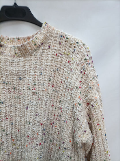 BERSHKA. Jersey beige hilos Colores T.s