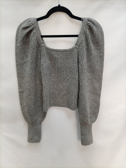 ZARA. Jersey gris mangas T.s