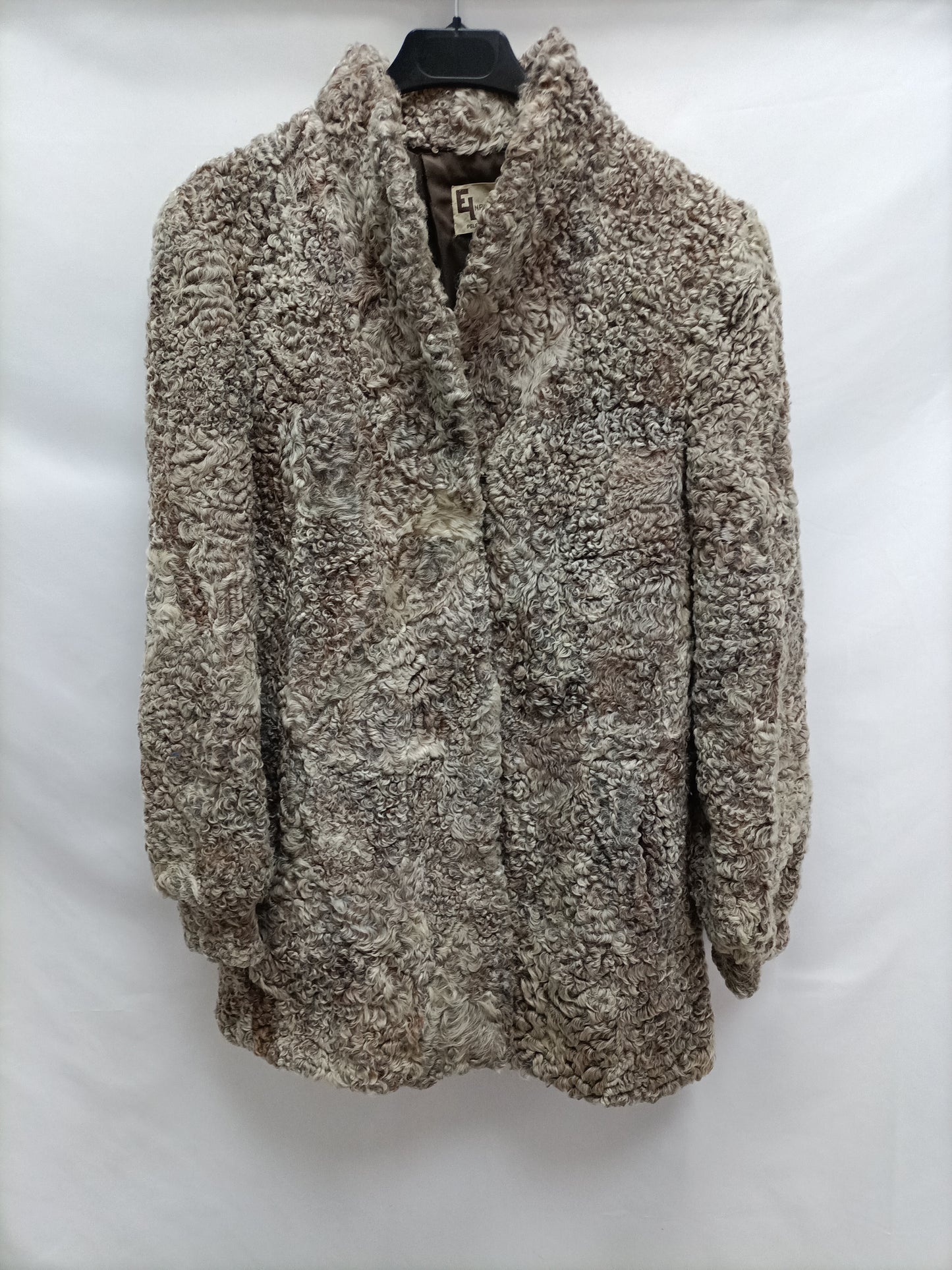 ENRIQUE LEZAUN. Beige shearling coat Tu(m)(tara)