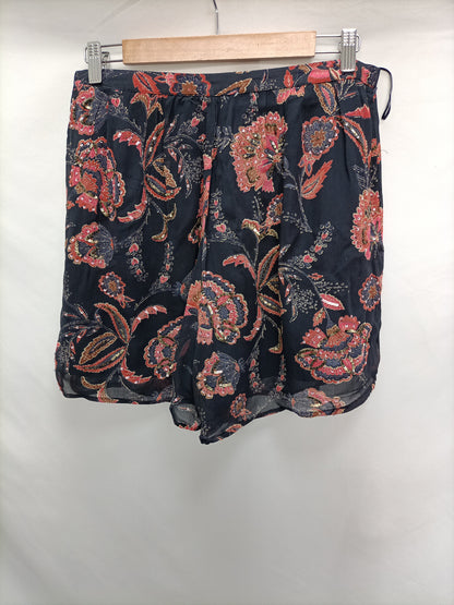 MANGO. Pantalón fluido floresT.40