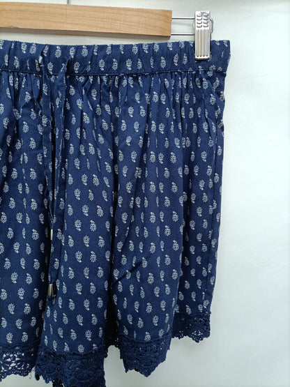 GREEN COART. Pantalón azul flores T.38