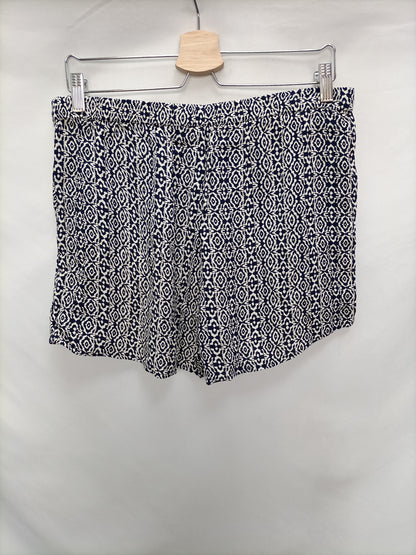 OYSHO. Pantalón étnico abalorios T.l