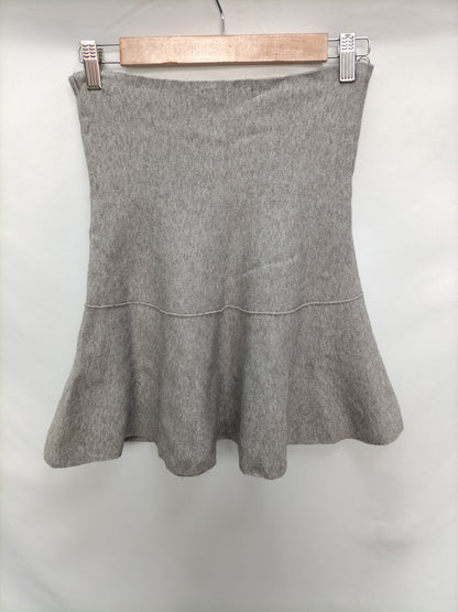 ZARA. Falda punto gris T.l