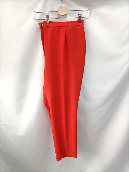 OTRAS. Pantalones vestir rojos. T 50