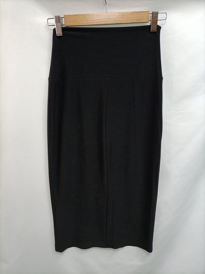 NORMA KAMALI. Falda negra licra T.xs