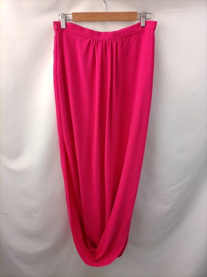 DAVID CHRISTIAN. Long pink skirt/trousers, size 40