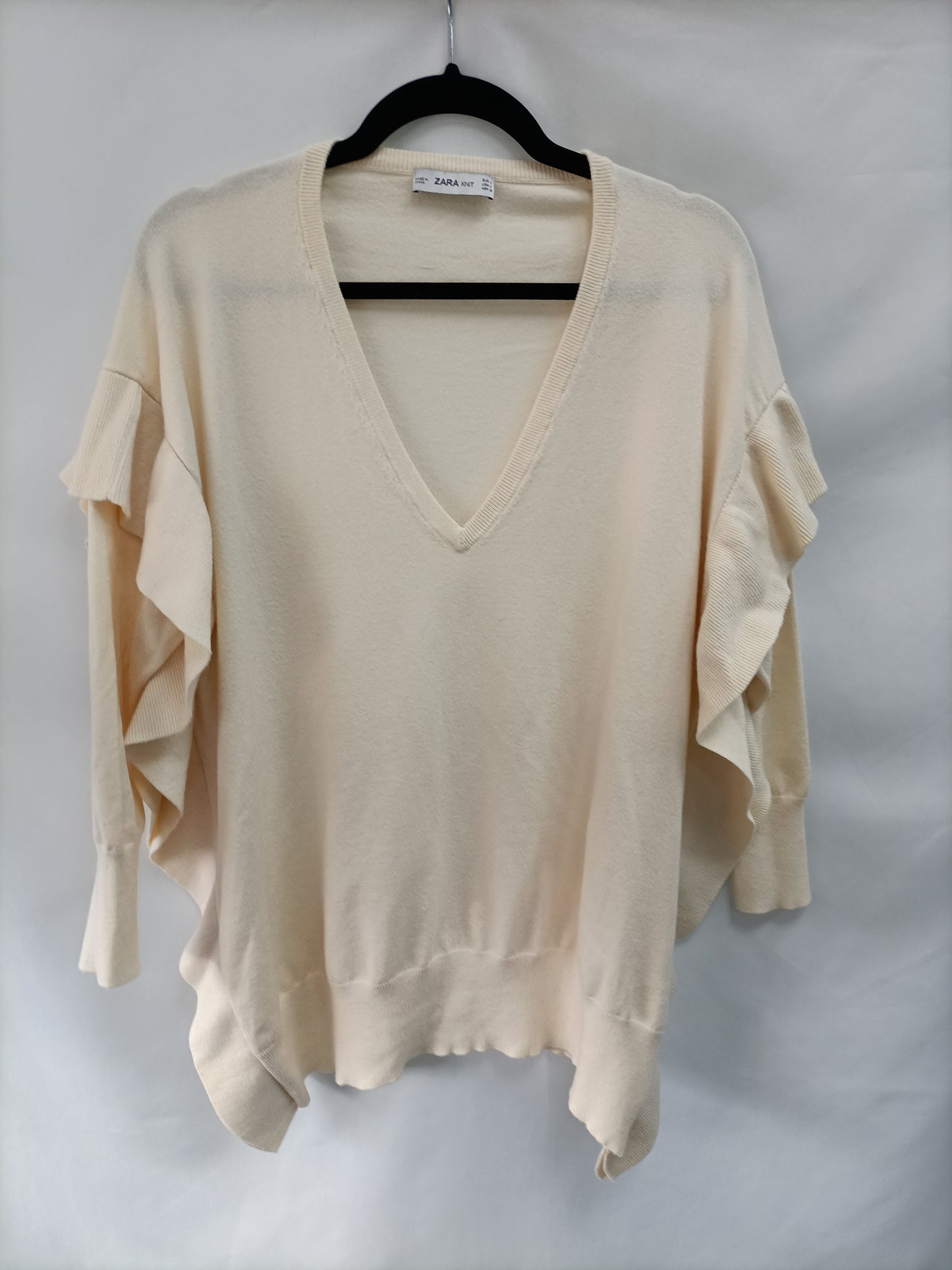 ZARA. Jersey beige volante  T.s