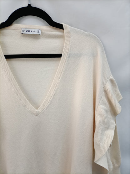 ZARA. Jersey beige volante  T.s
