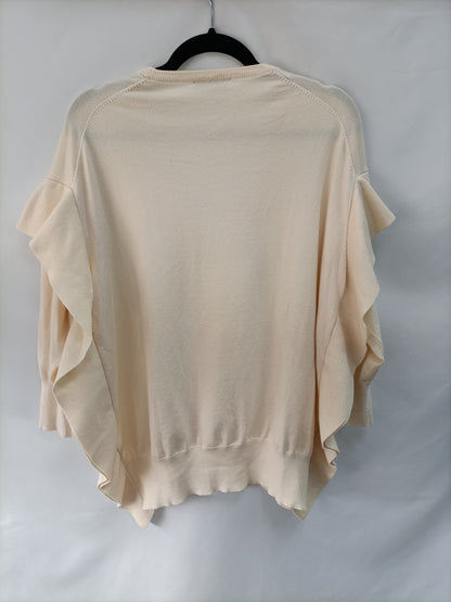 ZARA. Jersey beige volante  T.s