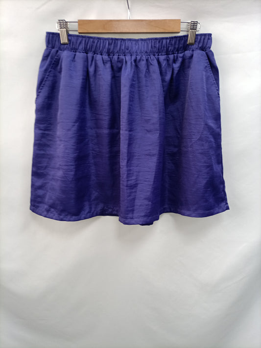 MANGO. Purple skirt Tm