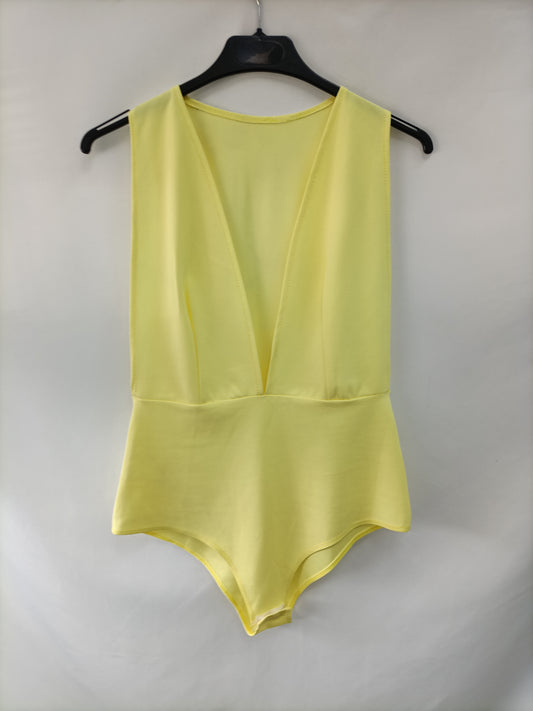OTRAS. Body elástico amarillo T.u(l)