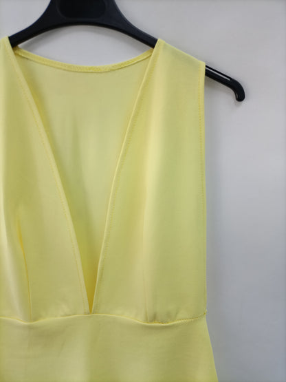 OTRAS. Body elástico amarillo T.u(l)