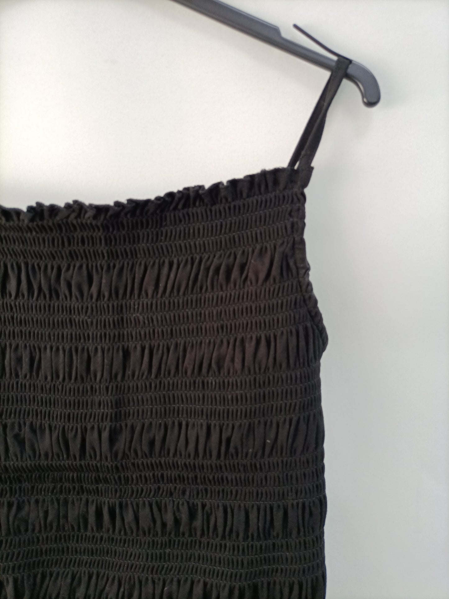 H&M. Top negro nido abeja T.m