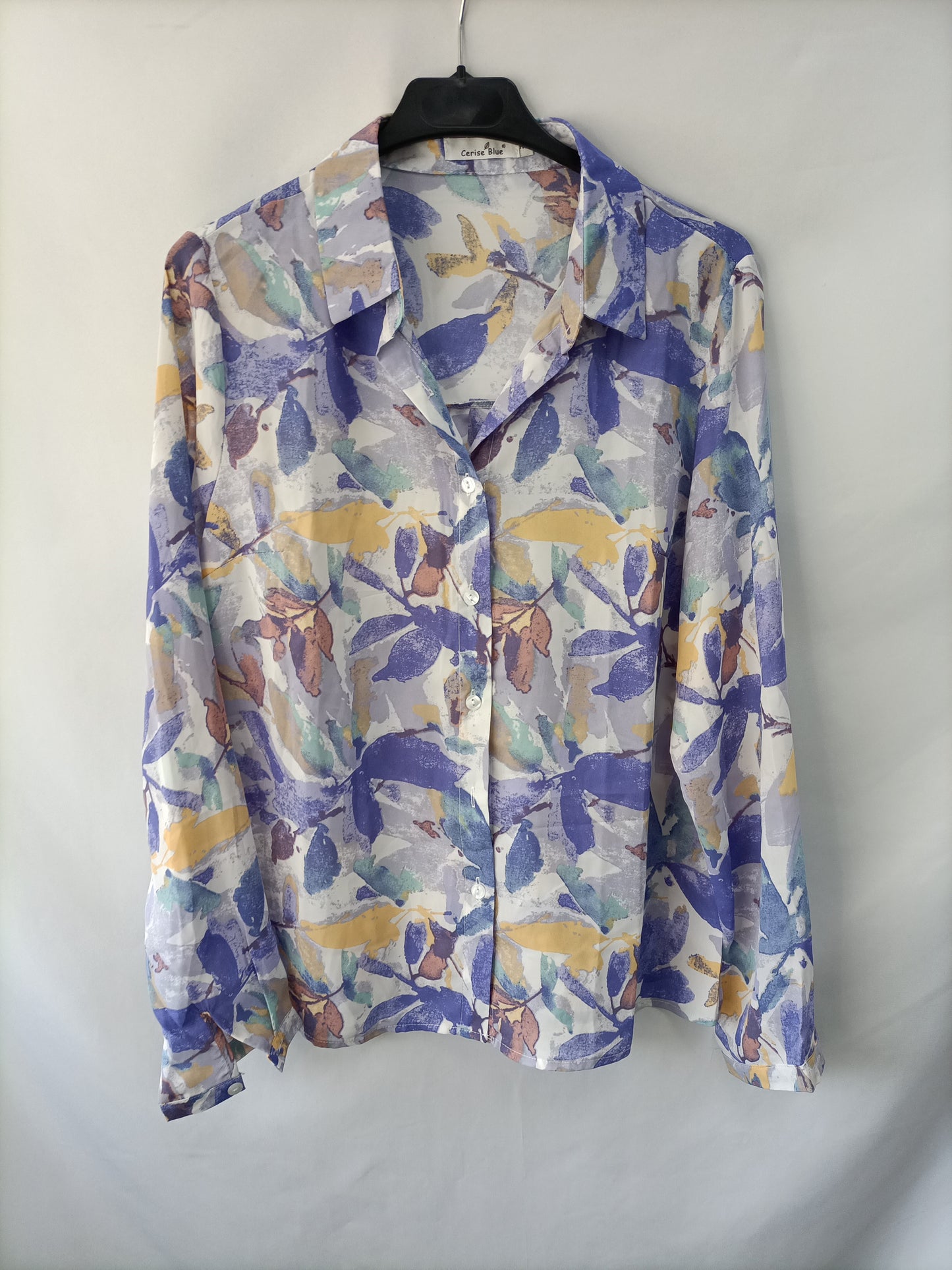 CERISE BLUE. Blusa fluida estampada  T.m