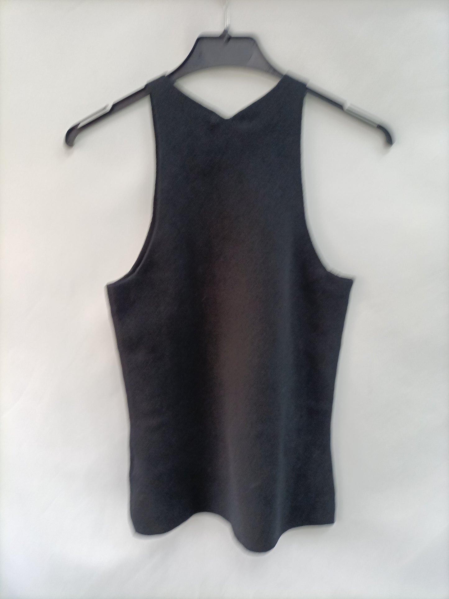H&M. Top negro punto T.m