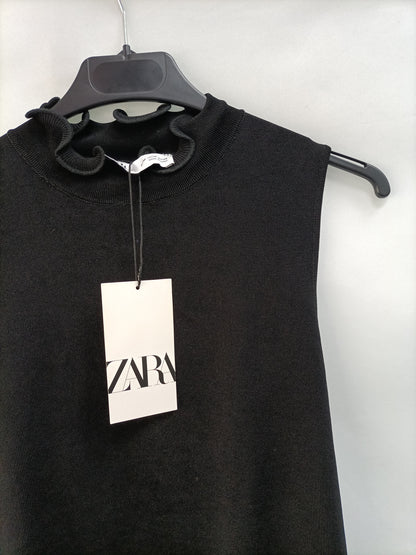 ZARA. Top punto negro T.m